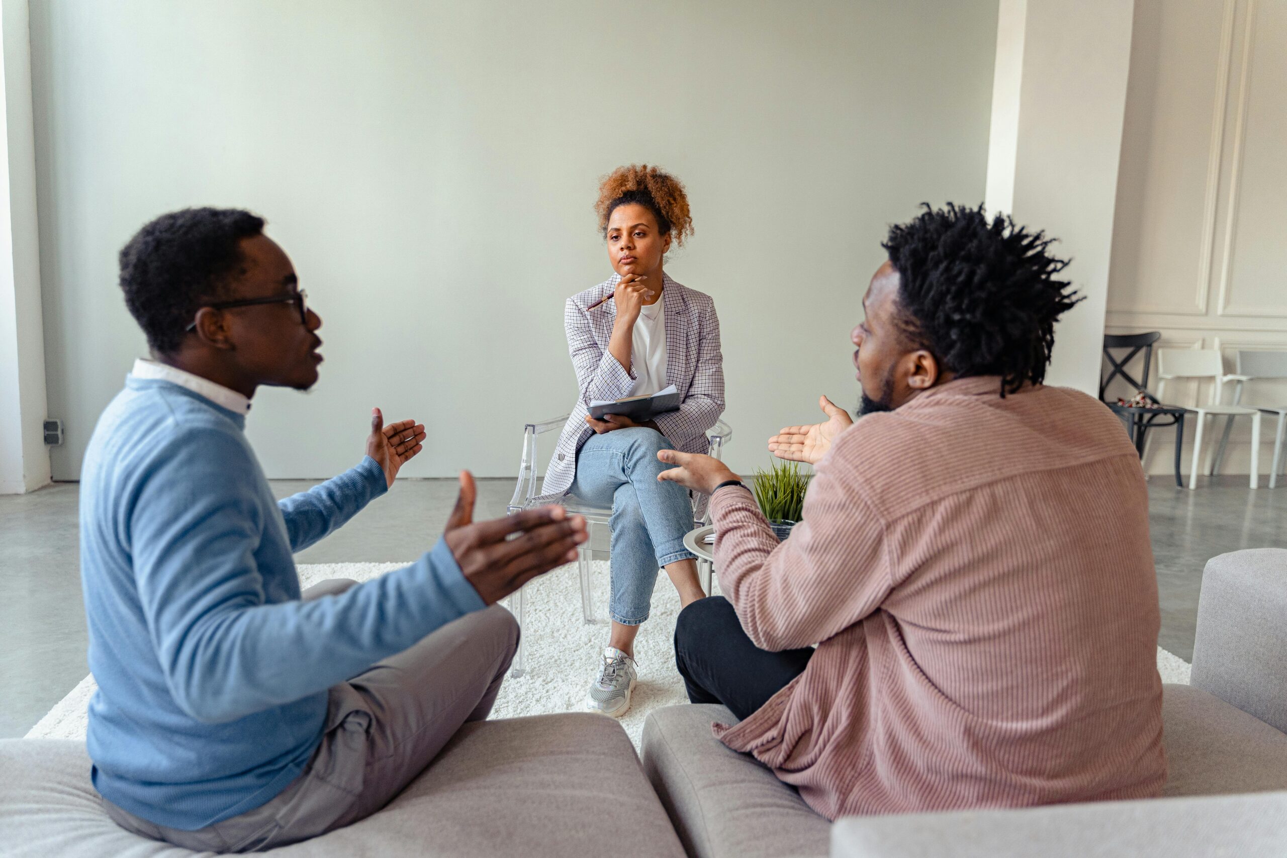 Two people arguing in therapy.