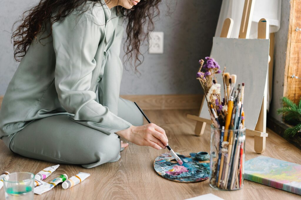 A woman practicing art therapy.