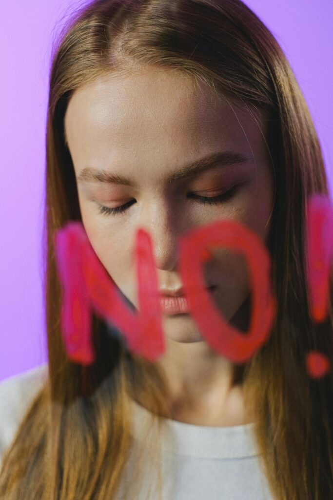 A woman overcoming peer pressure and saying no to drugs during her addiction recovery.