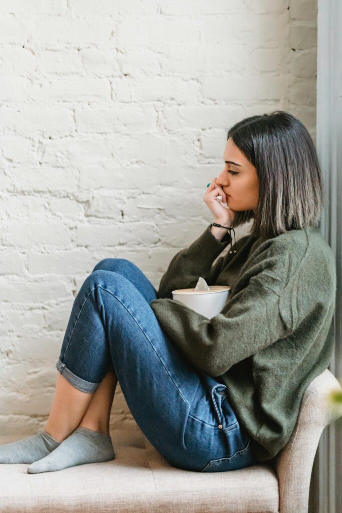A person managing stress by using stress management techniques.