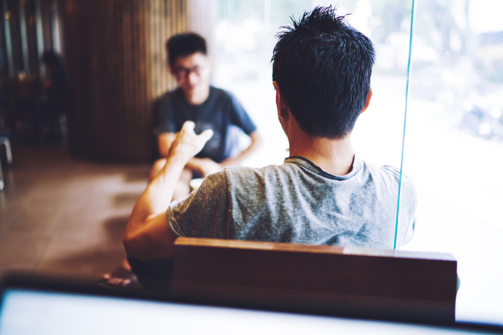 A friend helping a loved one start rehab.