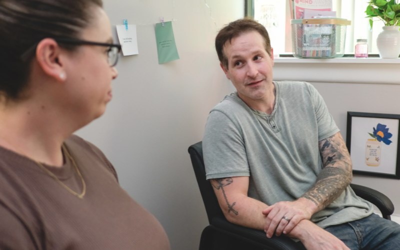 Clinician and client in therapy
